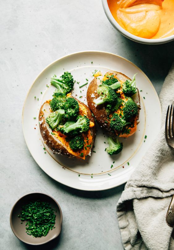 Best Baked Potato Recipes: Salt-Baked Potatoes with Cheesy Roasted Red Pepper Sauce and Broccoli from The First Mess | The Health Sessions