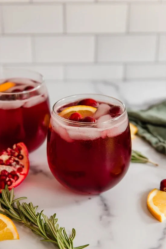 Festive Non-Alcoholic Drinks: Cranberry Pomegranate Holiday Mocktail from Unbound Wellness | The Health Sessions