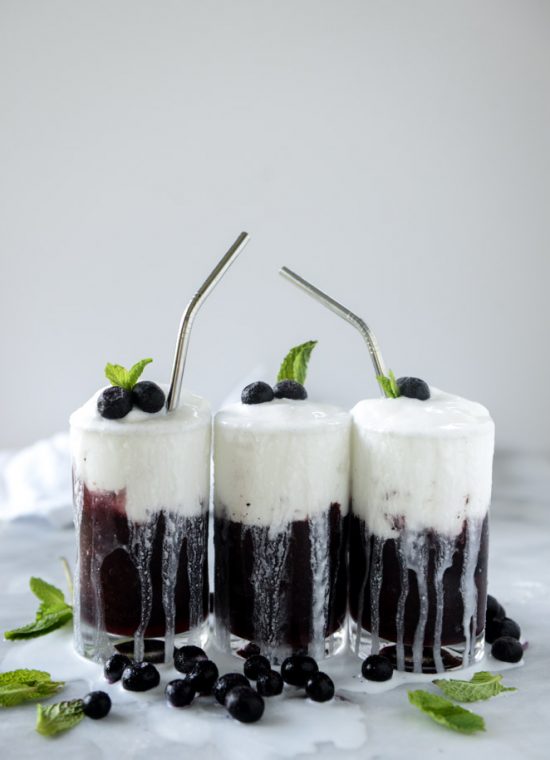 12 Refreshing Summer Drinks: Layered Blueberry Coconut Slush from howsweeteats.com | The Health Sessions